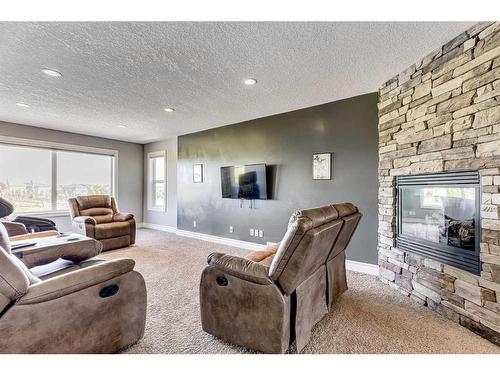 50 Sage Hill Way Nw, Calgary, AB - Indoor Photo Showing Living Room With Fireplace