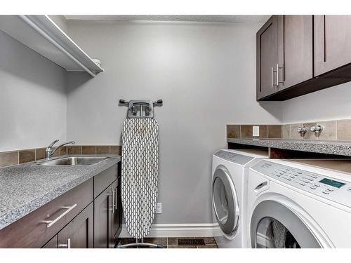 50 Sage Hill Way Nw, Calgary, AB - Indoor Photo Showing Laundry Room