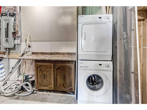 50 Sage Hill Way Nw, Calgary, AB - Indoor Photo Showing Laundry Room