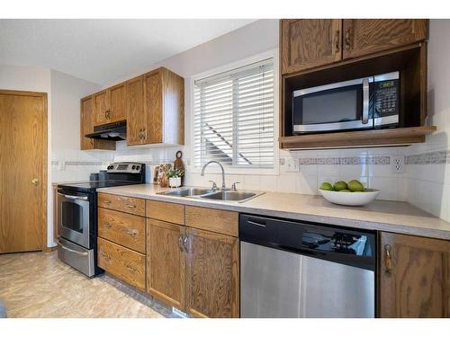 193 Citadel Circle Nw, Calgary, AB - Indoor Photo Showing Kitchen With Double Sink