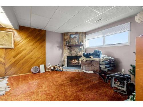 895 Pinecliff Drive Ne, Calgary, AB - Indoor With Fireplace