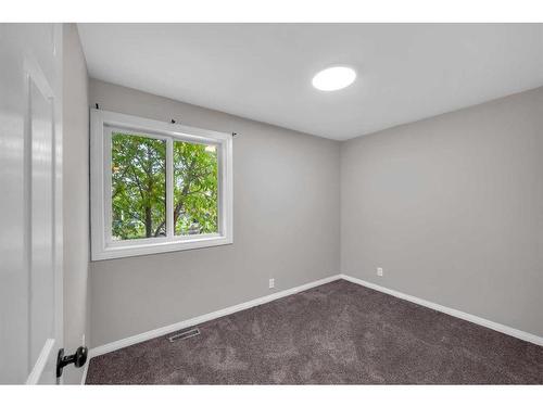 91 Emberdale Way Se, Airdrie, AB - Indoor Photo Showing Other Room