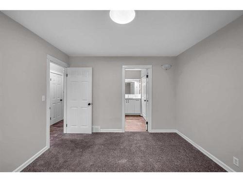 91 Emberdale Way Se, Airdrie, AB - Indoor Photo Showing Other Room