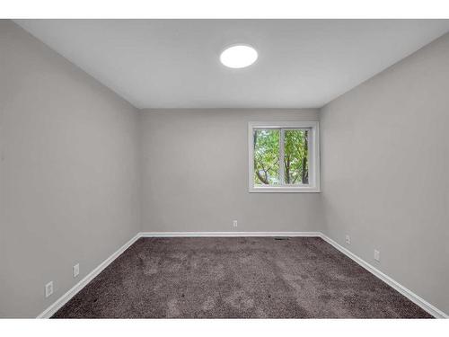 91 Emberdale Way Se, Airdrie, AB - Indoor Photo Showing Other Room