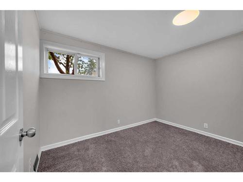 91 Emberdale Way Se, Airdrie, AB - Indoor Photo Showing Other Room