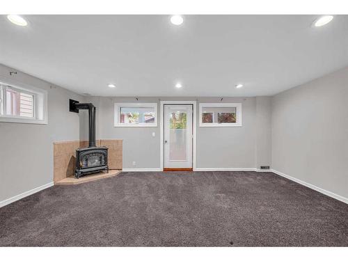 91 Emberdale Way Se, Airdrie, AB - Indoor With Fireplace