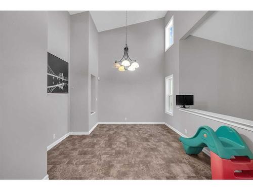 91 Emberdale Way Se, Airdrie, AB - Indoor Photo Showing Other Room