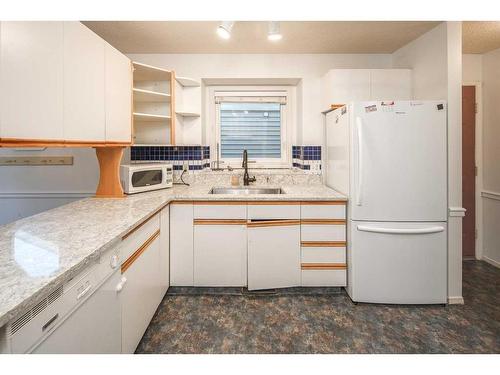 1235 Sandpiper Road Nw, Calgary, AB - Indoor Photo Showing Kitchen