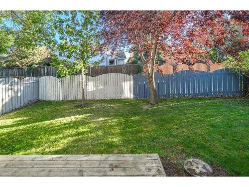 1235 Sandpiper Road Nw, Calgary, AB - Outdoor With Backyard