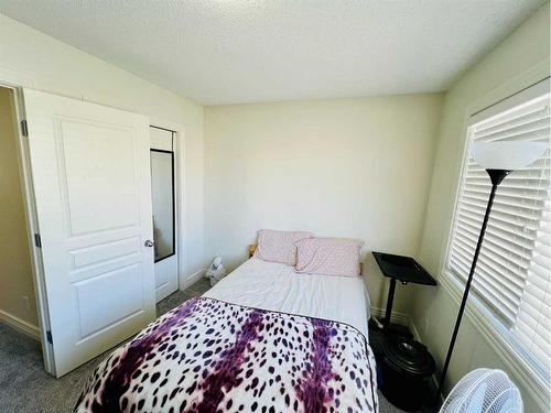 56 Bridleridge Manor  Sw, Calgary, AB - Indoor Photo Showing Bedroom