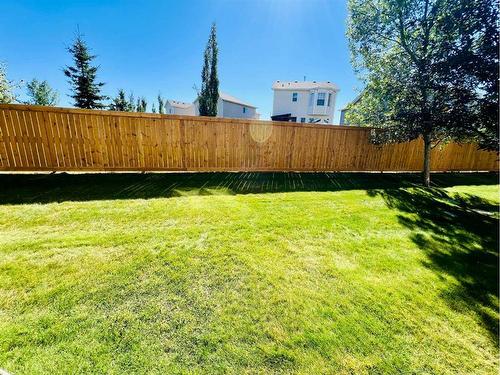 56 Bridleridge Manor  Sw, Calgary, AB - Outdoor With Backyard