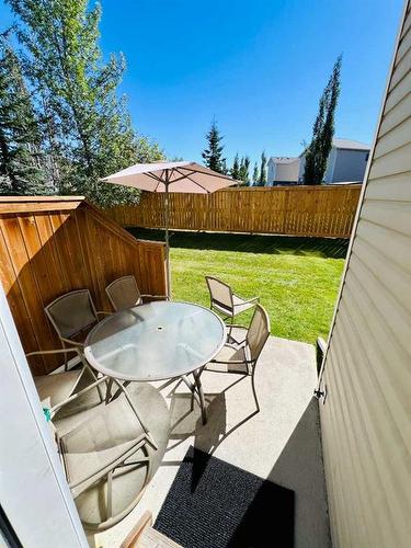 56 Bridleridge Manor  Sw, Calgary, AB - Outdoor With Deck Patio Veranda