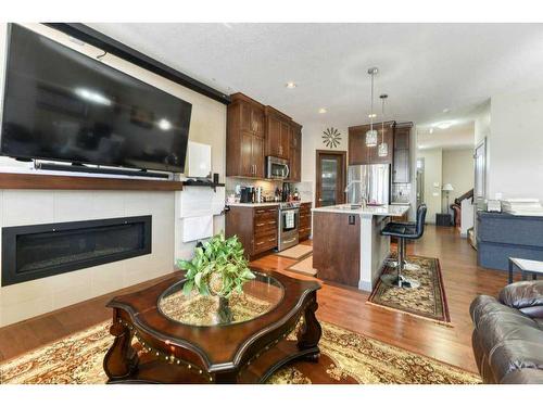 89 Redstone Plaza Ne, Calgary, AB - Indoor Photo Showing Living Room With Fireplace