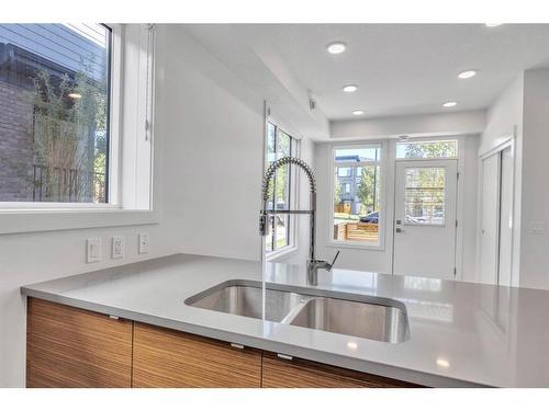 19625 45 Street Se, Calgary, AB - Indoor Photo Showing Kitchen With Double Sink