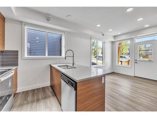 19625 45 Street Se, Calgary, AB - Indoor Photo Showing Kitchen With Double Sink