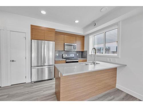 19625 45 Street Se, Calgary, AB - Indoor Photo Showing Kitchen With Stainless Steel Kitchen