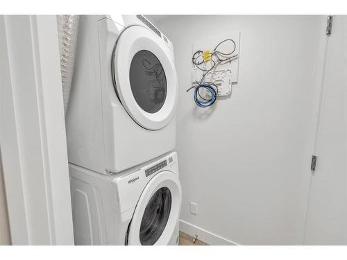 19625 45 Street Se, Calgary, AB - Indoor Photo Showing Laundry Room