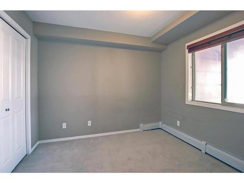 110-15 Saddlestone Way Ne, Calgary, AB - Indoor Photo Showing Other Room