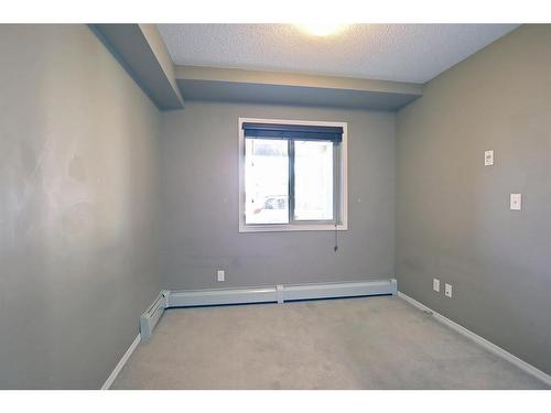 110-15 Saddlestone Way Ne, Calgary, AB - Indoor Photo Showing Other Room