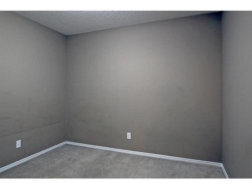 110-15 Saddlestone Way Ne, Calgary, AB - Indoor Photo Showing Other Room