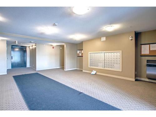 110-15 Saddlestone Way Ne, Calgary, AB - Indoor Photo Showing Other Room