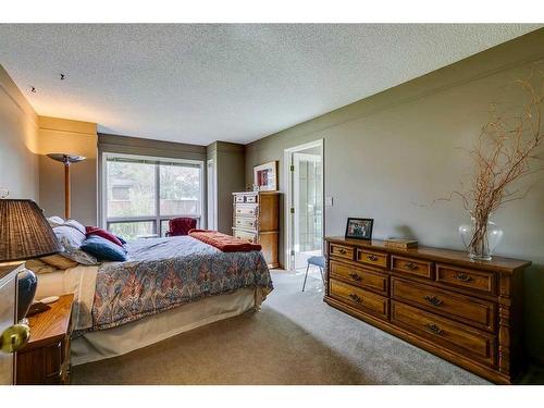 938 Suncastle Drive Se, Calgary, AB - Indoor Photo Showing Bedroom