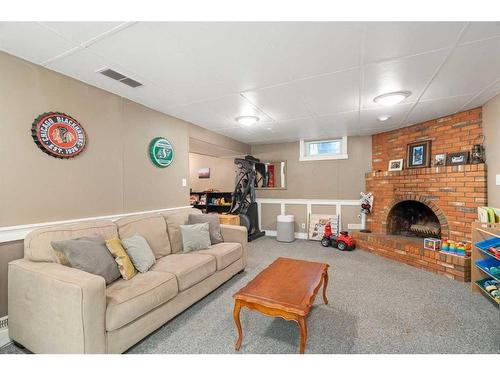 83 Alderwood Close Se, Calgary, AB - Indoor Photo Showing Basement