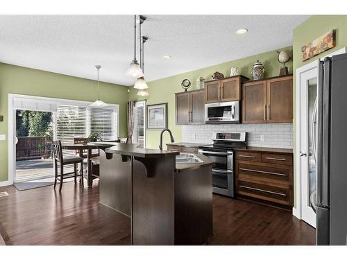 249 New Brighton Lane Se, Calgary, AB - Indoor Photo Showing Kitchen With Stainless Steel Kitchen With Upgraded Kitchen