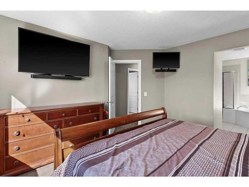 249 New Brighton Lane Se, Calgary, AB - Indoor Photo Showing Bedroom