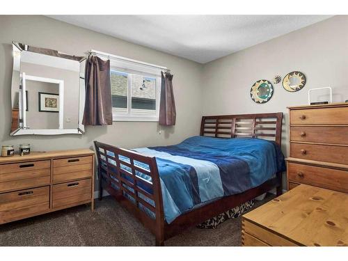 249 New Brighton Lane Se, Calgary, AB - Indoor Photo Showing Bedroom