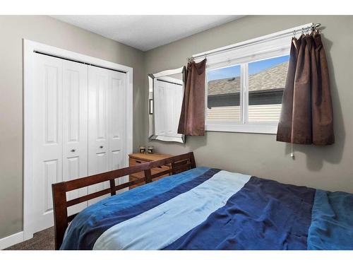 249 New Brighton Lane Se, Calgary, AB - Indoor Photo Showing Bedroom