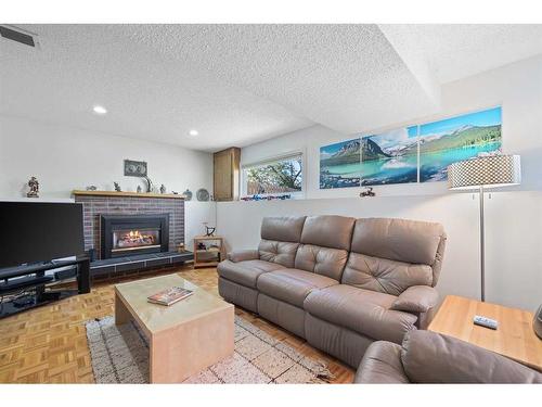 23 Bedwood Rise Ne, Calgary, AB - Indoor Photo Showing Living Room With Fireplace