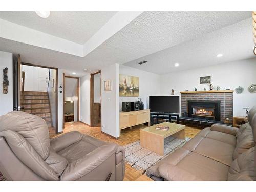 23 Bedwood Rise Ne, Calgary, AB - Indoor Photo Showing Living Room With Fireplace