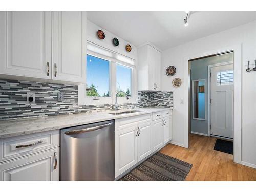 23 Bedwood Rise Ne, Calgary, AB - Indoor Photo Showing Kitchen With Double Sink