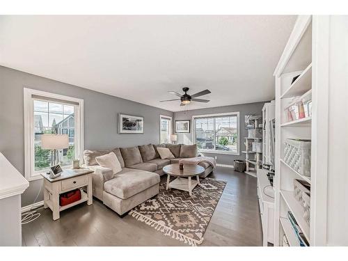 139 Coopersfield Way Sw, Airdrie, AB - Indoor Photo Showing Living Room