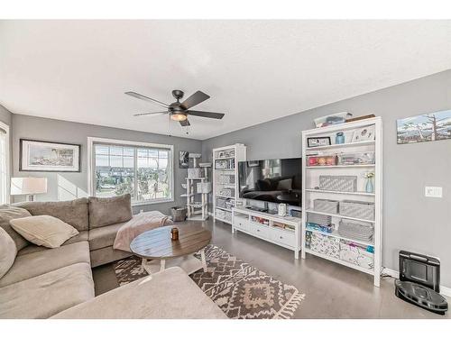 139 Coopersfield Way Sw, Airdrie, AB - Indoor Photo Showing Living Room