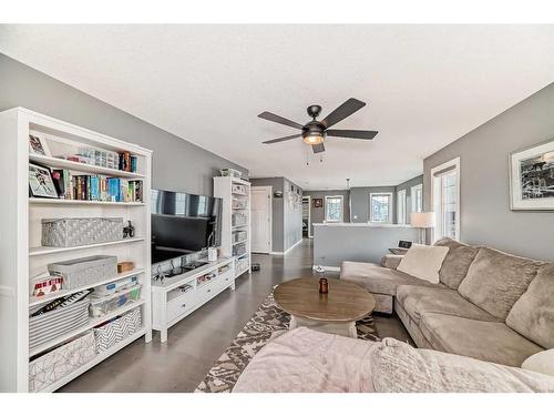 139 Coopersfield Way Sw, Airdrie, AB - Indoor Photo Showing Living Room