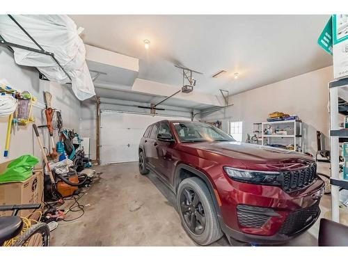 139 Coopersfield Way Sw, Airdrie, AB - Indoor Photo Showing Garage