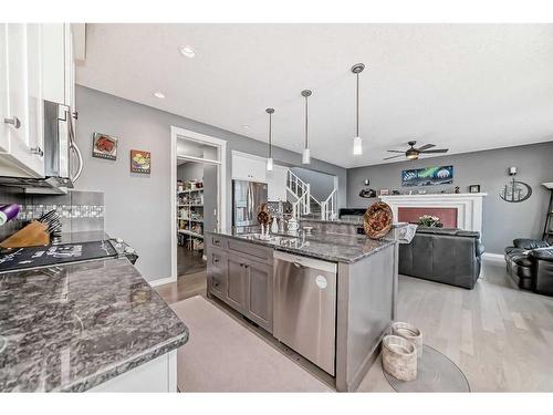 139 Coopersfield Way Sw, Airdrie, AB - Indoor Photo Showing Kitchen With Upgraded Kitchen