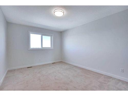 501-33 Merganser Drive, Chestermere, AB - Indoor Photo Showing Other Room