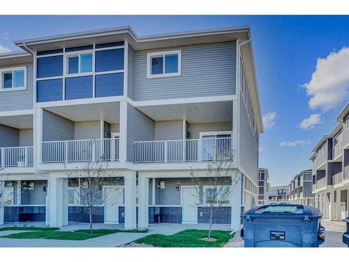 501-33 Merganser Drive, Chestermere, AB - Outdoor With Balcony With Facade