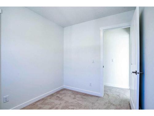 501-33 Merganser Drive, Chestermere, AB - Indoor Photo Showing Other Room