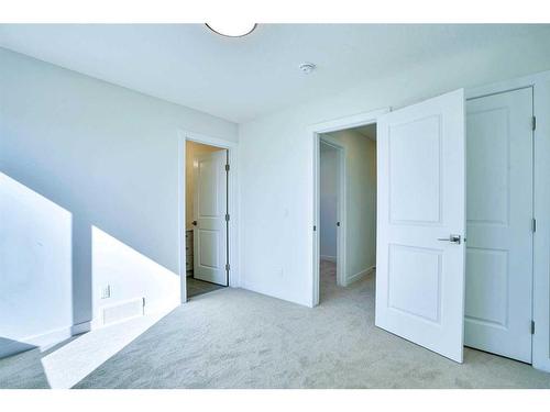 501-33 Merganser Drive, Chestermere, AB - Indoor Photo Showing Other Room