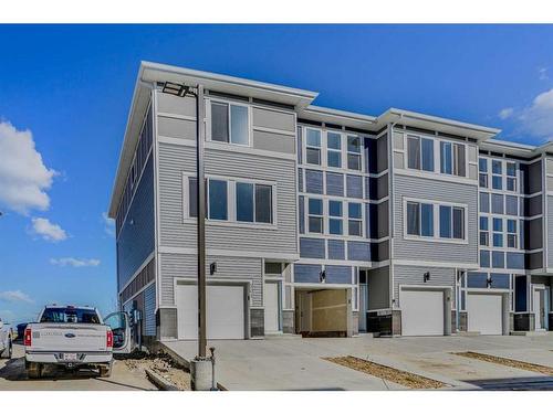 501-33 Merganser Drive, Chestermere, AB - Outdoor With Facade