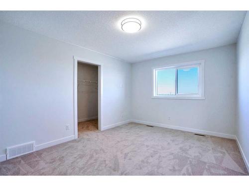 501-33 Merganser Drive, Chestermere, AB - Indoor Photo Showing Other Room