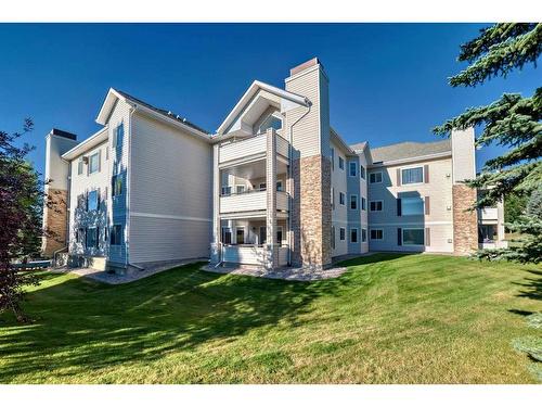 1106-7451 Springbank Boulevard Sw, Calgary, AB - Outdoor With Balcony With Facade