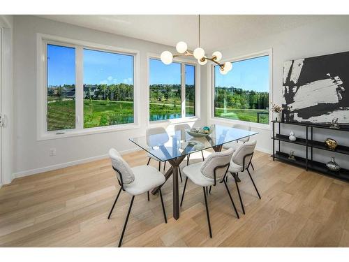 343 Spring Creek Circle Sw, Calgary, AB - Indoor Photo Showing Dining Room