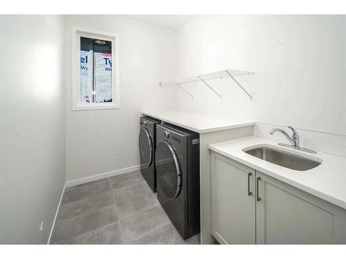 343 Spring Creek Circle Sw, Calgary, AB - Indoor Photo Showing Laundry Room