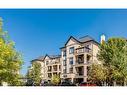 2305-310 Mckenzie Towne Gate Se, Calgary, AB  - Outdoor With Balcony With Facade 