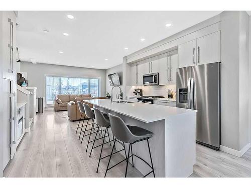 1254 Carrington Boulevard Nw, Calgary, AB - Indoor Photo Showing Kitchen With Upgraded Kitchen